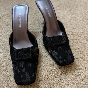 Lacy black slip on w/kitten heel